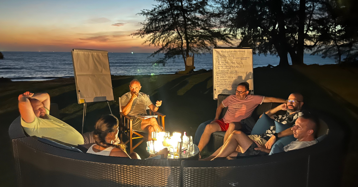 ESME group in an evening beachside coaching circle