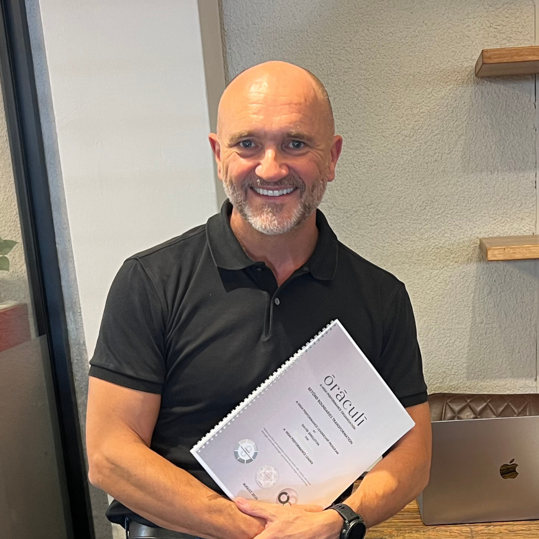 David Singleton holding the BEYŌND Boundaries workbook