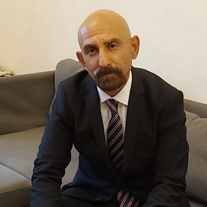 Dr. Elkan Polad