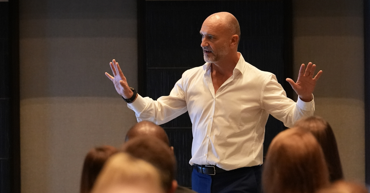 David Singleton speaking to an audience