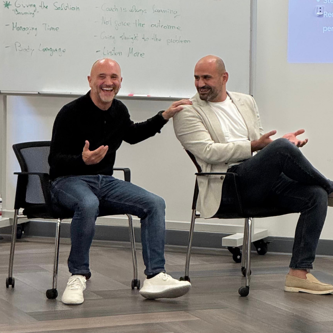 David Singleton facilitating a coaching workshop at a whiteboard